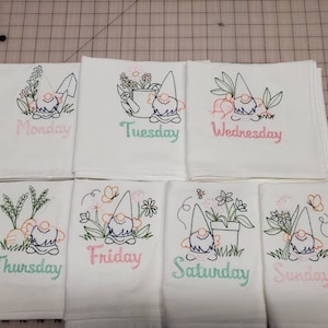Flour sack dish towels. Days of the week garden gnome.
