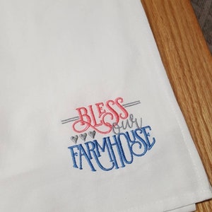 Embroidered dish towl.  Bless our Farmhouse