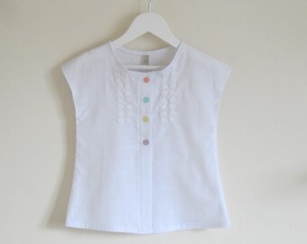 Girls Blouse in Pure White Cotton with Daisy Chain Front Detail and Feature Buttons