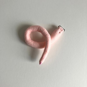 Coda di maiale in feltro con clip: accessorio per costume rosa