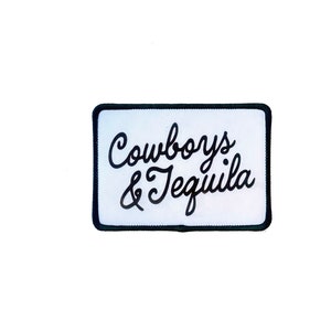 May include: White rectangular patch with black stitching around the edges. The patch has black text that reads "Cowboys & Tequila" in a cursive font.