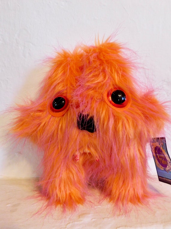 monster stuffed animal with teeth