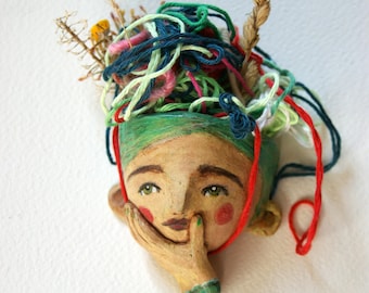 Flowery thoughts, wall flower holder, unique pieces, think, reflect, art, wall decoration, terracotta, gift, closed eyes, meditate, unique
