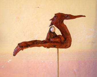On the Dragon, flight with the dragon, sculpture, wood and terracotta, branch with the shape of a dragon, dream, story, legend, table art, unique piece