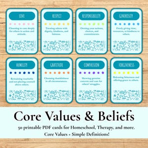 May include: A set of eight teal cards with rounded corners, each featuring a core value like "Love" and "Respect" with a definition. The cards are arranged on a wooden surface. The text "Core Values & Beliefs" is displayed below the cards.