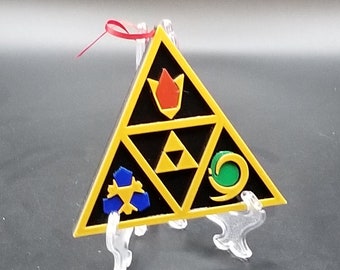 Adorno navideño inspirado en las piedras espirituales de Zelda Ocarina of Time