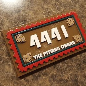 Placa de dirección personalizada con temática polinesia y nombre de familia