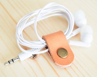 Cord Clip in Russet > Solid Brass Snap > Full Grain Leather > Cord Keeper > Cord Organiser > Antique Brass Snap > Ear Bud Organiser