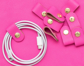 Cord Clip in Neon Pink > Italian Leather >Solid Brass Snap > Cord Keeper > Cord Organiser > Ear Bud Organiser > Cable Wrap > Cable Organizer