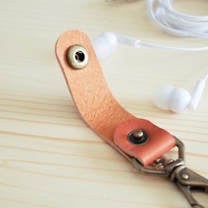 Swivel Snap Cord Clip &gt; Add Key Ring &gt; Solid Brass Hardware &gt; Solid Iron Key Ring &gt; Vegetable Tanned Leather &gt; Cord Wrap &gt; Cord Organizer