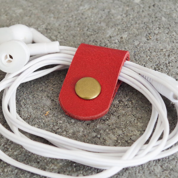 Cord Clip in Red > Solid Brass Snap > Full Grain Leather > Cord Keeper > Cord Organiser > Antique Brass Snap > Ear Bud Organiser