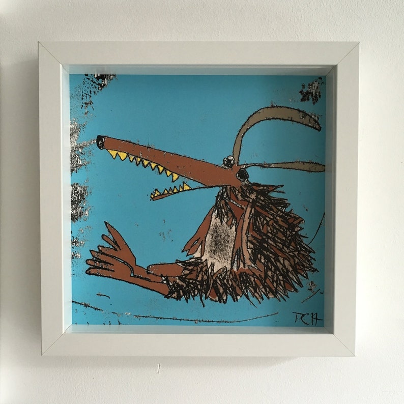 May include: A framed illustration of a brown, furry creature with a long snout and sharp teeth. The creature has a yellow horn and is set against a blue background. The artist's initials, "RCH", are in the bottom right corner.