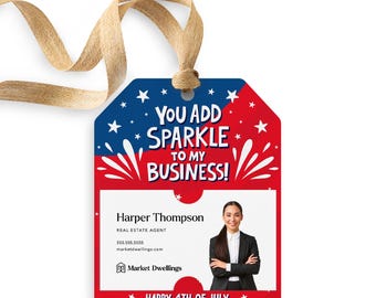 May include: Red, white, and blue tag with a firework design and the text "You add sparkle to my business!"  The tag also includes a photo of a woman with the text "Harper Thompson, Real Estate Agent, 555.555.5555, marketdwellings.com, Market Dwellings, *Happy 4th of July*"