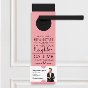 May include: Pink door hanger with the text "I'm not just a real estate agent, I'm also your neighbor. Call me to get your home sold."  A business card with a woman's photo and the text "Harper Thompson, Real Estate Agent, Market Dwellings" is attached to the bottom of the door hanger.