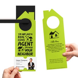 a door hanger that has a picture of a house on it