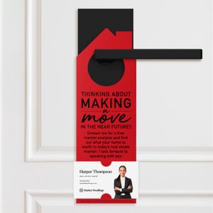 a red door hanger with a black handle