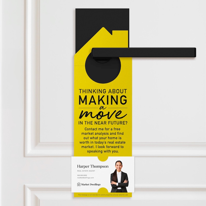a yellow door hanger with a black handle