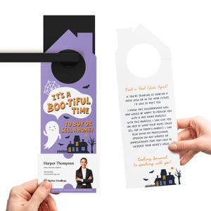 May include: A Halloween-themed door hanger and business card set. The purple door hanger features a house shape with the text "It's a Boo-tiful Time to Buy or Sell a Home!" and a ghost graphic. The business card displays a real estate agent's information.