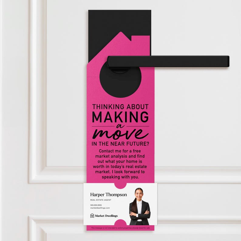 a pink door hanger with a black handle