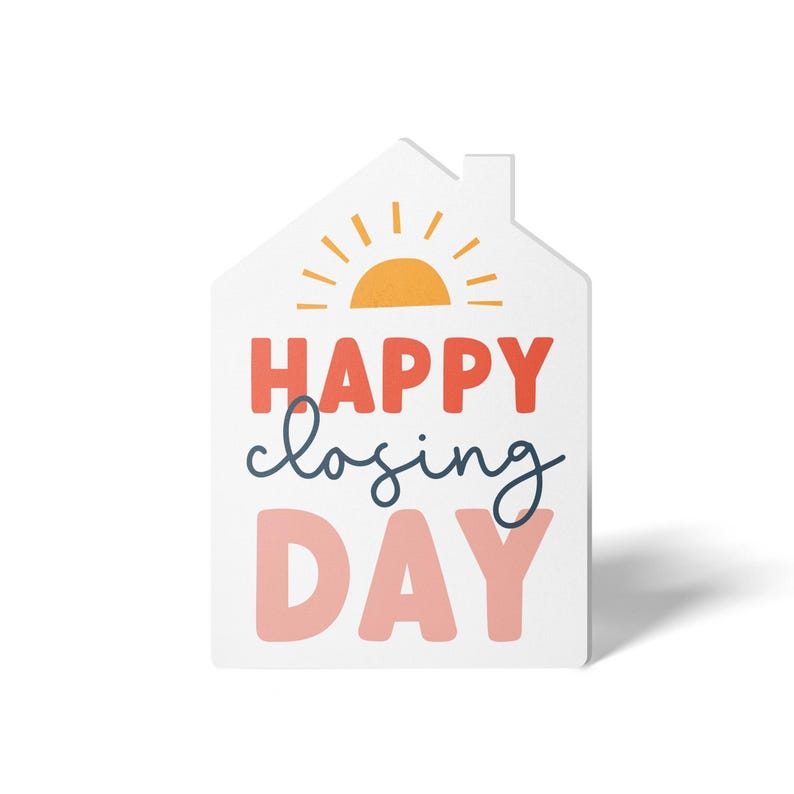 May include: White house-shaped sign with a yellow sun and the text "HAPPY closing DAY" in pink, red, and blue.
