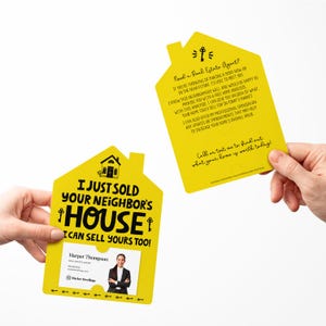 May include: Yellow house-shaped card with the text "I just sold your neighbour's house I can sell yours too!" and a photo of a real estate agent. The back of the card has the text "Need a Real Estate Agent?" and a message about the agent's services.