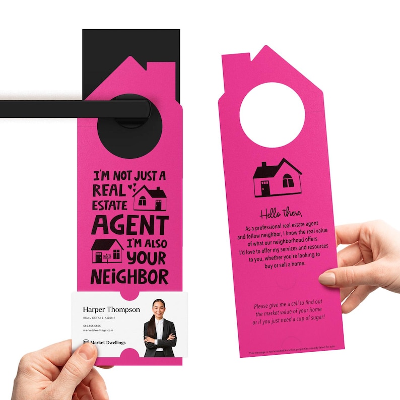 a pink door hanger with a picture of a house