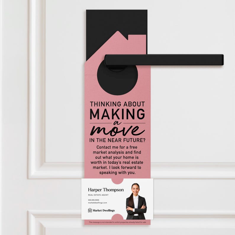 a pink door hanger with a black handle