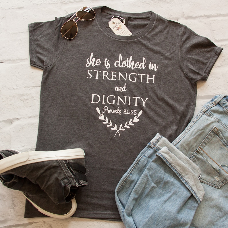she is clothed in strength and dignity shirt