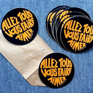 Autocollants/Stickers "Allez tous vous faire aimer" Calligramme orange sur fond noir - Pochette de 10 stickers