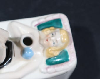 Art Deco Porcelain Ashtray Pin up Lady With Rocking Legs, Naughty