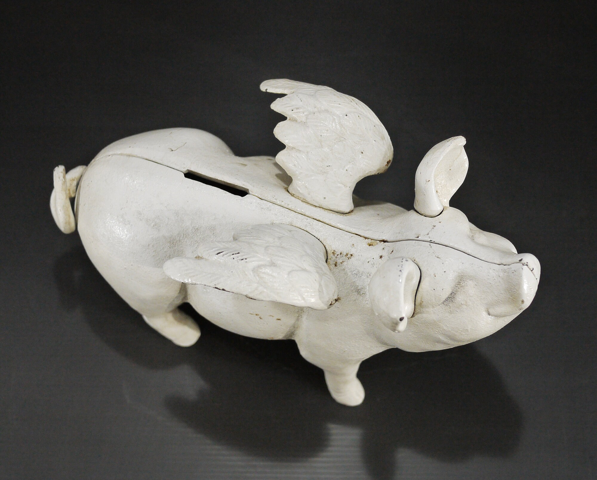 Antique Flying Peg Piggy Bank, White Cast Iron Peg Sculpture Coin Bank