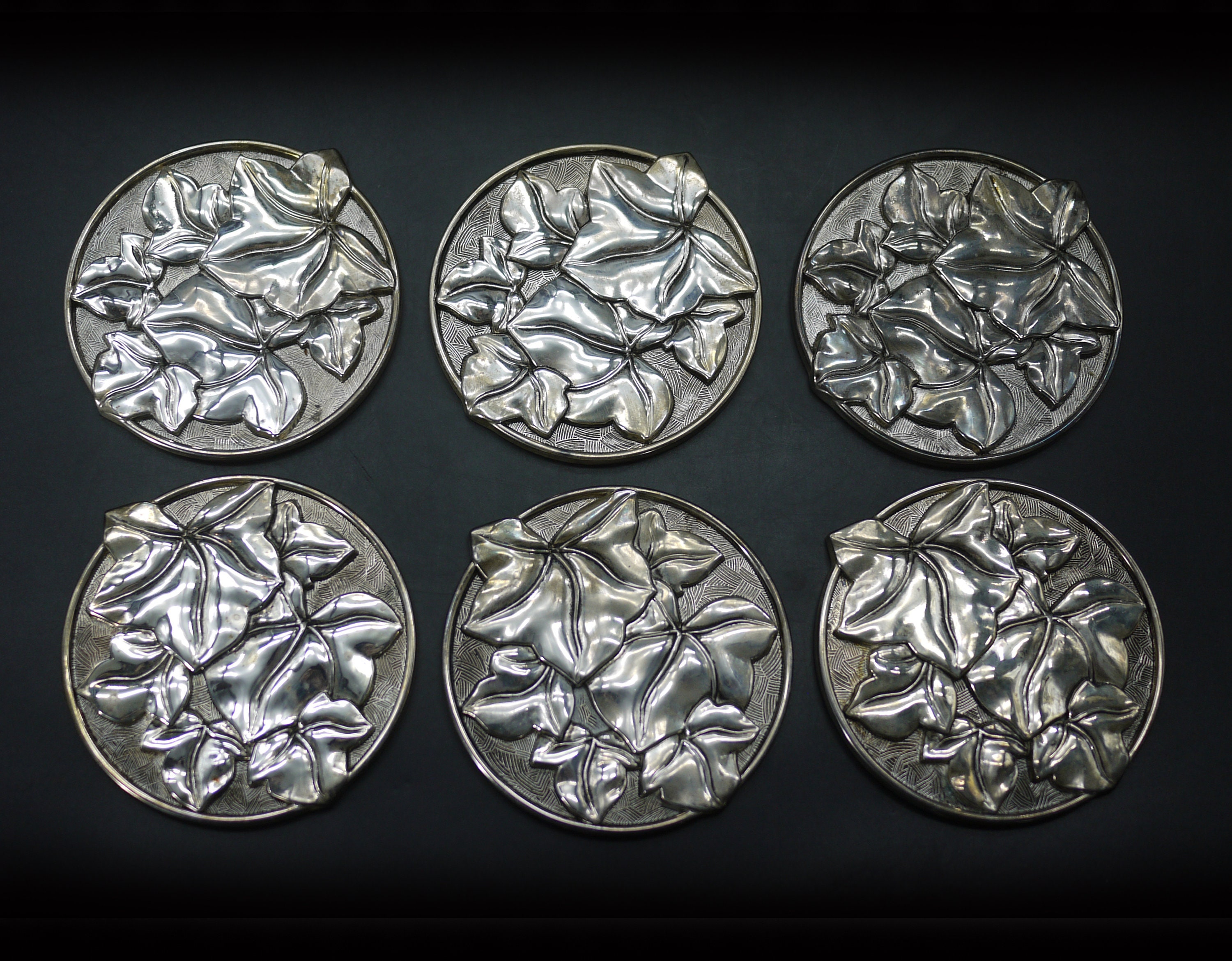 Vintage Repousse Silver Plated Coasters By Silea