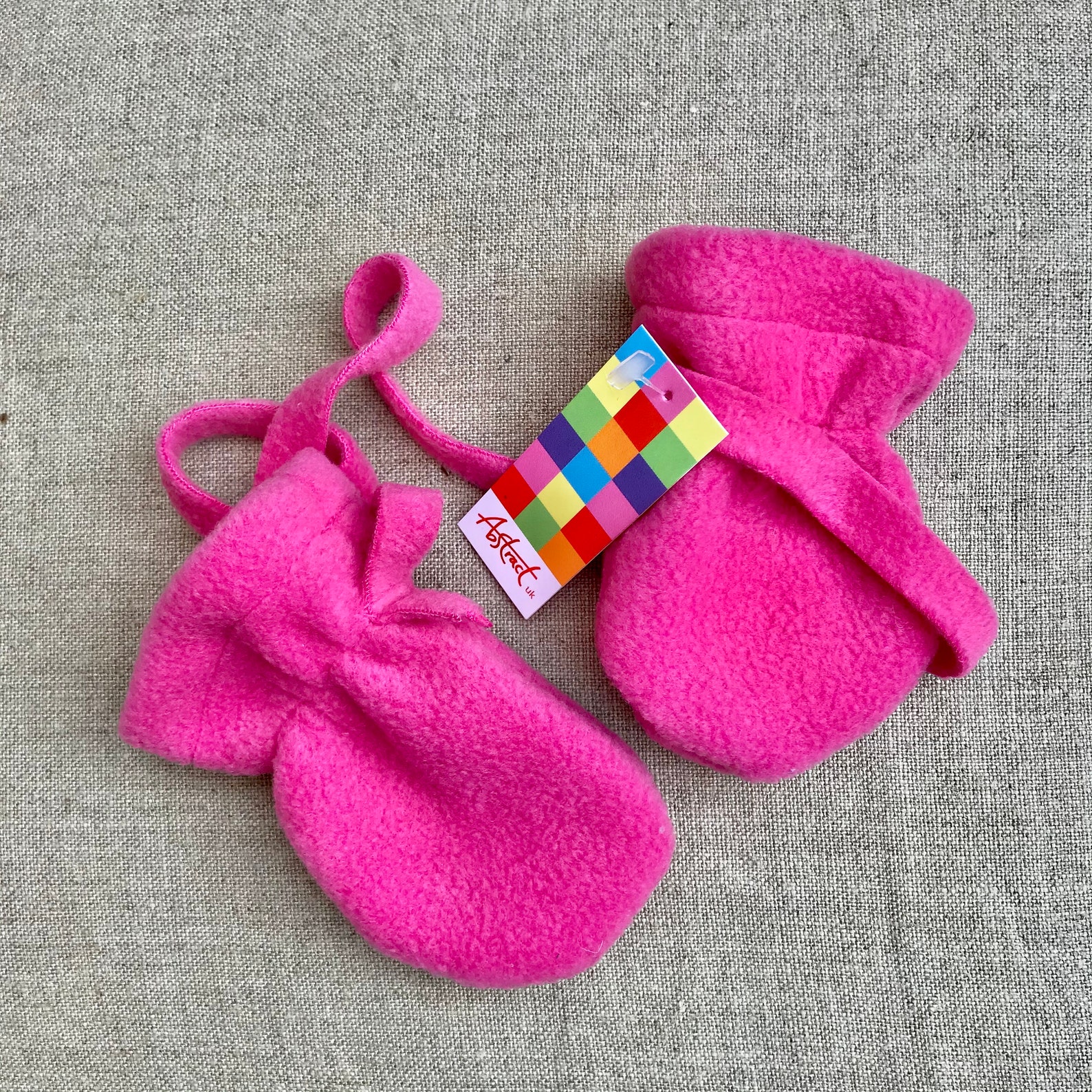 Thumbless fleece baby mittens on a string assorted colours & sizes