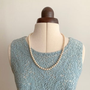 Long Faux Pearl Single Strand Necklace Matinee Length With Fish hook Clasp Closure Set With White Rhinestones