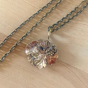 Valu-Koru Bronze Pendant Necklace With Ribes Berries Finnish Jewelry Design Jorma Valu 1970s, 1980s