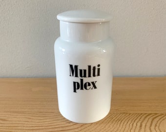 Bouteille en verre de lait d'apothicaire vintage avec couvercle Pot de vitamines multiplex Bouteille de médicaments en verre opalin