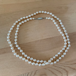 Long Faux Pearl 33 inch Necklace Single Strand Peach Colored With Fish hook Clasp Closure Set With White Rhinestones