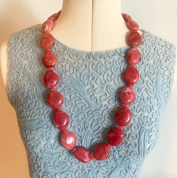 Red plastic shop bead necklace