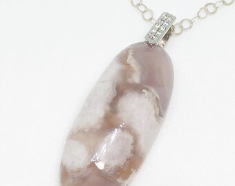 Authentic Sakura Cherry Blossom Agate Oval Necklace. Beautiful natural blossoms in Agate - clear auric energy. Comes w sterling silver chain