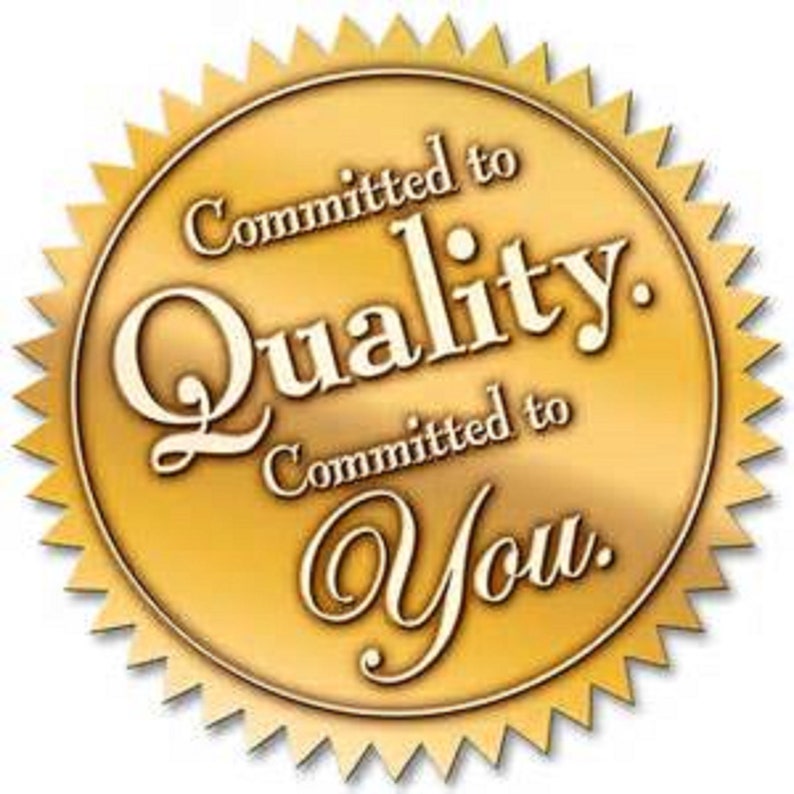 May include: A gold-coloured seal with a starburst edge. The text "Committed to Quality. Committed to You." is displayed in a stylized font within the seal. The design suggests a mark of excellence and quality.