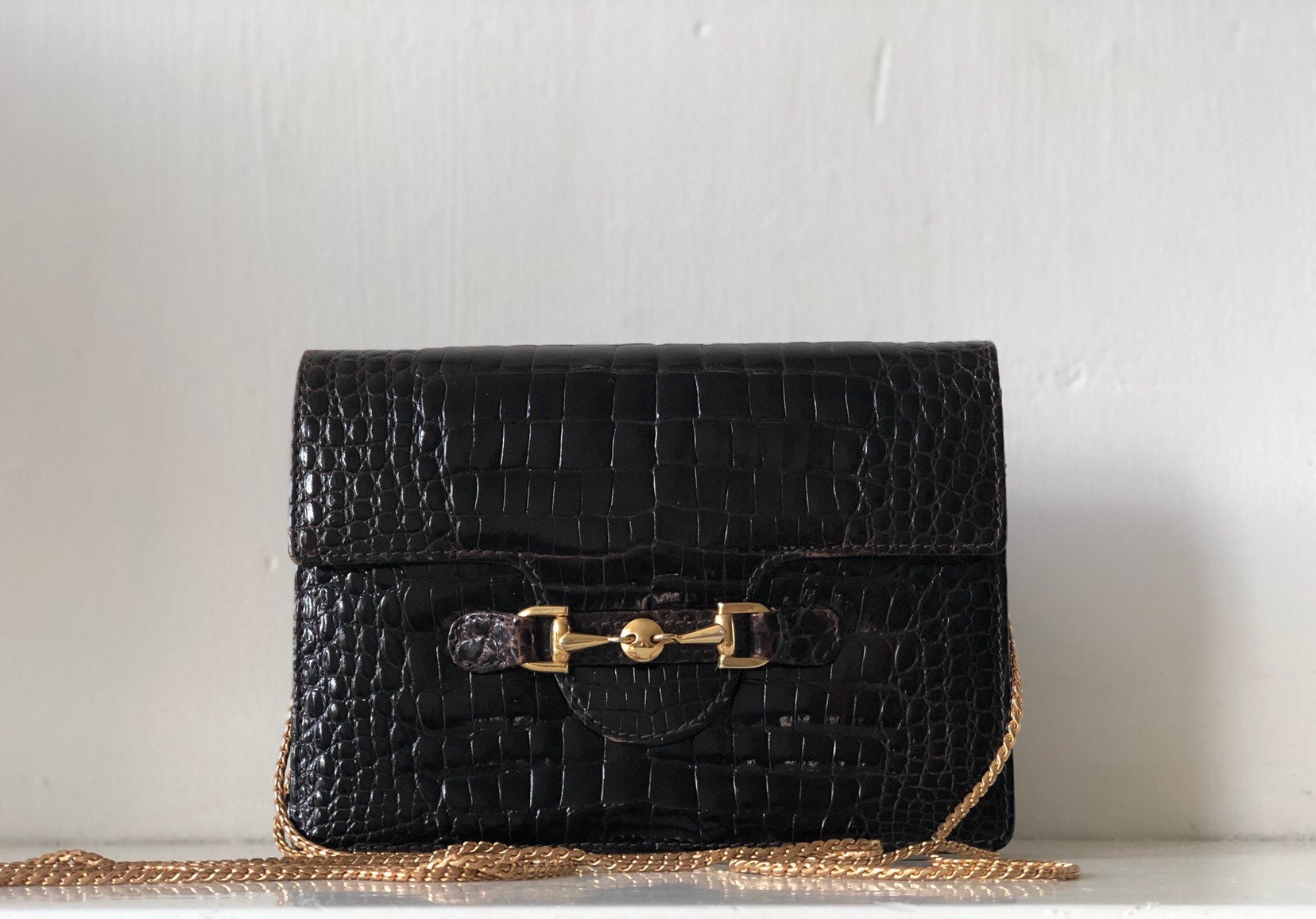 Médor leather clutch bag