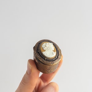 Vintage brass cameo pill box, small brass pill box, vintage gold pill box, oval brass trinket box, antique cameo trinket box, brass ring box