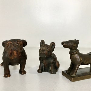 Bronze dog figurine.  French bulldog, English Bulldog by Blecher USA (repaired see listing) and chinese religious dog.