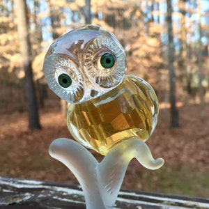 Crystal owl on tree branch figurine. vintage amber and clear cut glass  owl with green eyes sitting on frosted tree branch. wise owl decor