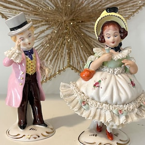 Dresden lace Victorian man and woman figurines. Lot of 2 Dresden Germany figures top hat man bonnet lady. Lace ruffle trim
