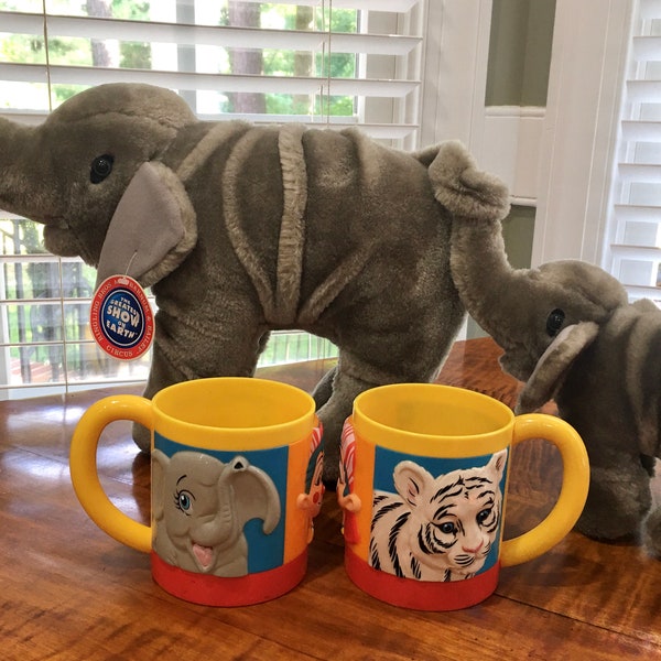 Ringling Brothers Barnum and Bailey souvenirs. Choice tiger elephant clown plastic cup, mother baby connected by tail elephants plush 2002