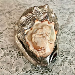 cameo conch shell signed M + M Scognamiglio. Silver plated dipped carved cameo shell. Italy