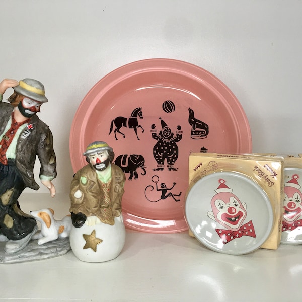 clown circus choice. Emmett Kelly Flambro puppy / ball figurines, Hazel Atlas pink glass circus dish, storybook clown drawer pull knobs