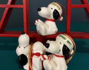 Snoopy ceramic ornament. Candy cane, laying on gift. 1977, 1979. sold separately