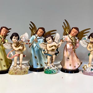 set of 6 Hong Kong angel cherub with musical instruments figurine ornaments. vintage hard plastic Christmas religious decor.